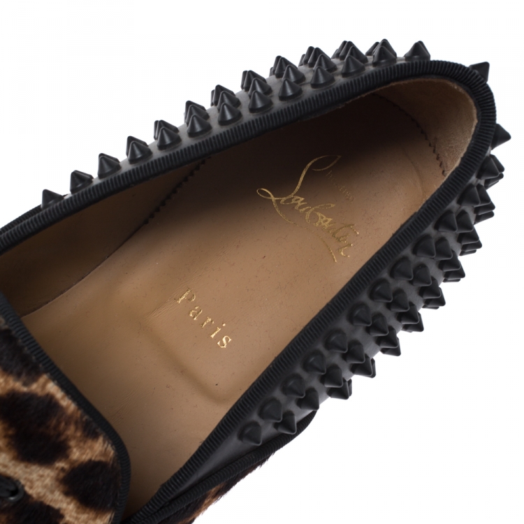 Pre Owned Christian Louboutin Leopard Print Pony Hair And Black Leather Spiked Tassilo Loafers Size 42.5