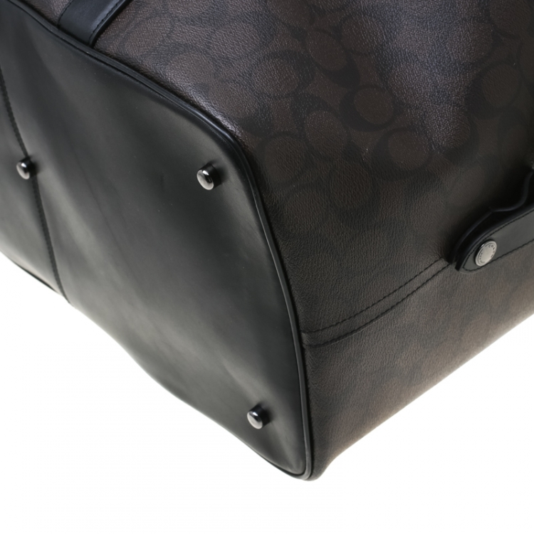 Pre Owned Coach Brown/Black Signature Coated Canvas and Leather Voyager Bag