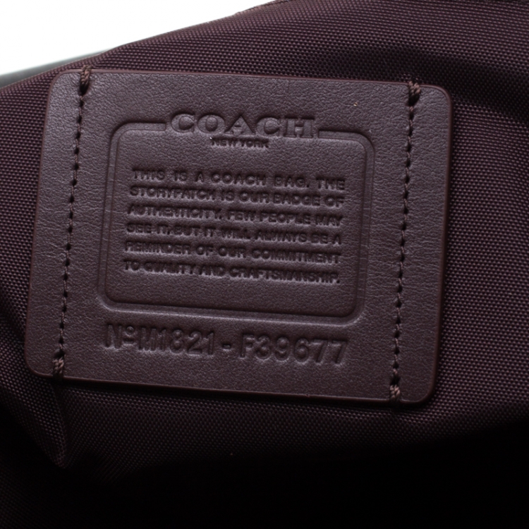 Pre Owned Coach Black/Copper Signature Canvas and Leather Voyager 52 Bag