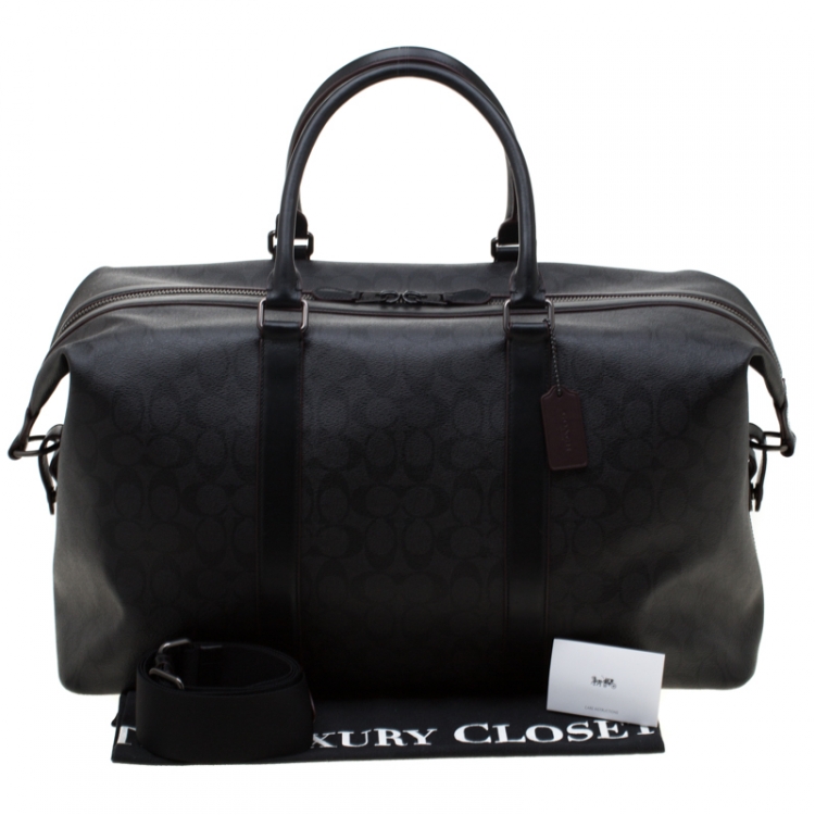 Pre Owned Coach Black/Copper Signature Canvas and Leather Voyager 52 Bag
