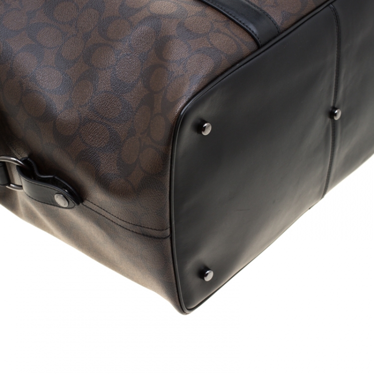 Pre Owned Coach Brown/Black Signature Coated Canvas Metropolitan Duffle Bag
