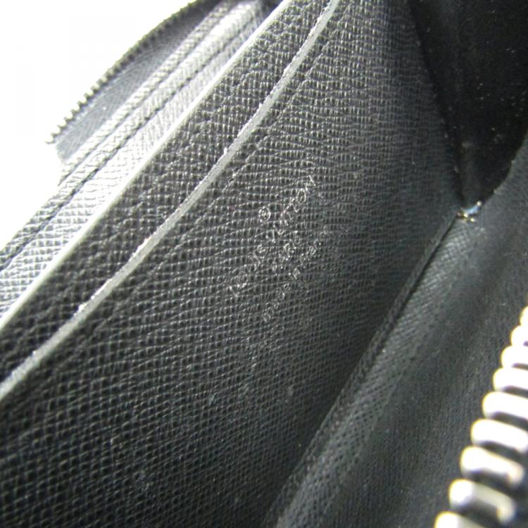 Pre Owned Louis Vuitton Noir Taiga Leather Vertical Zippy Coin Purse