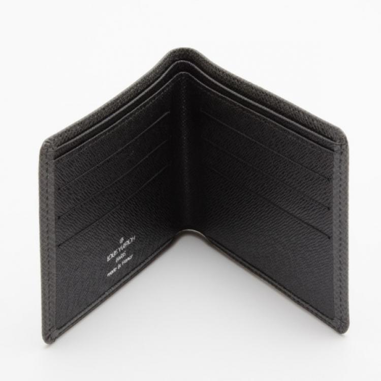Pre Owned Louis Vuitton Taiga 6 CC Slots Wallet 