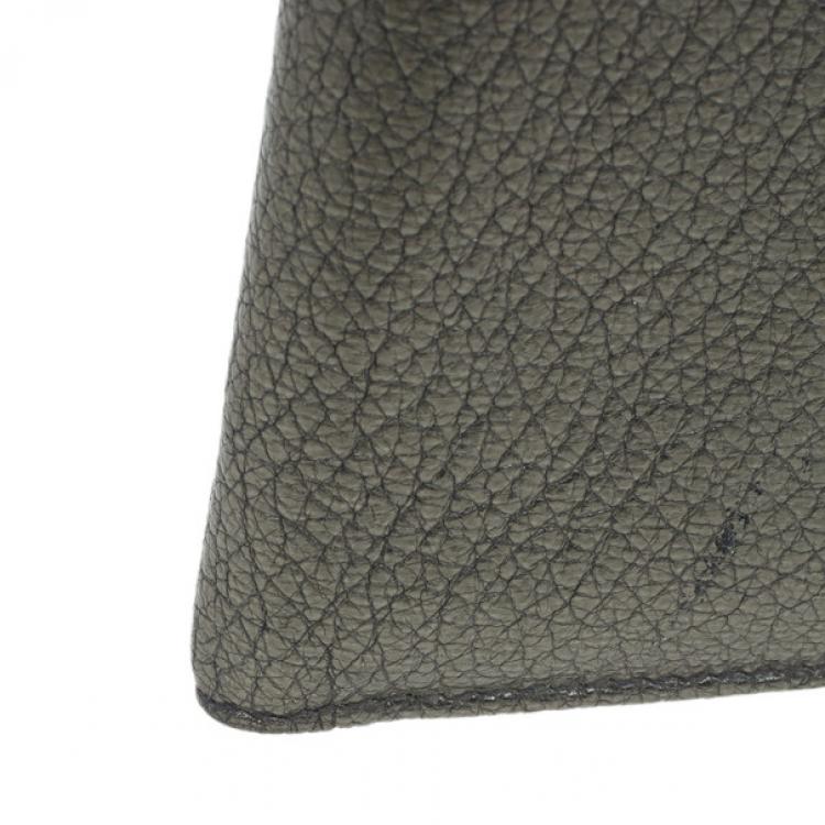 Pre Owned Saint Laurent Paris Silver Metallic Leather Bifold Wallet