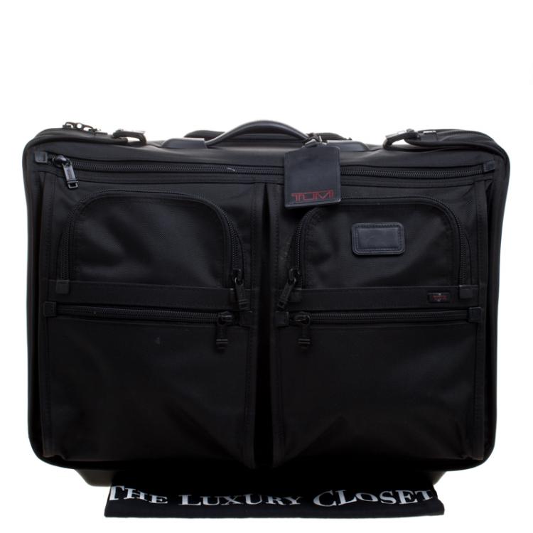 Pre Owned Tumi Black Nylon Carry On Garment Rolling Suitcase
