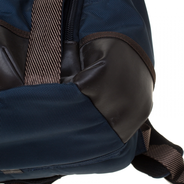 tumi blue leather backpack