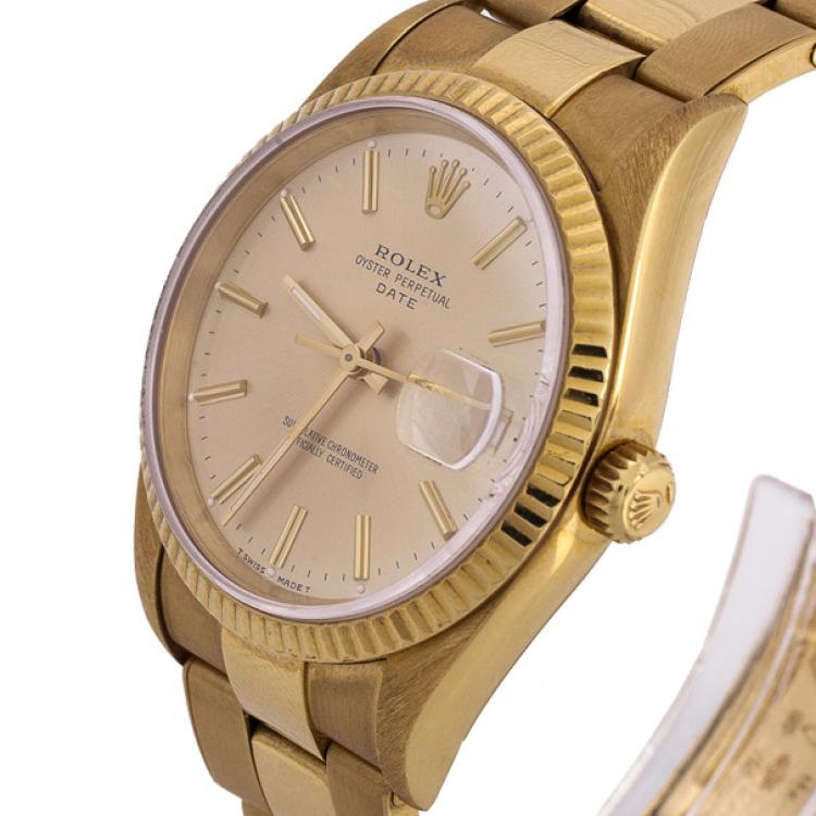 Pre Owned Rolex Oyster Perpetual Date 18 K Yellow Gold Womens Wristwatch 34 MM