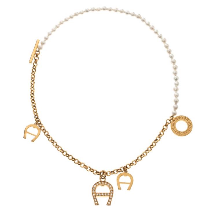 Pre Owned Aigner Faux Pearl Crystal Gold Tone Toggle Bracelet