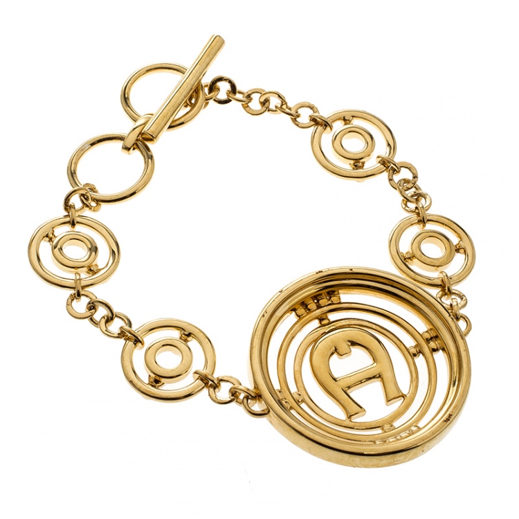 Pre Owned Aigner Crystal Studded Gold Tone Toggle Bracelet