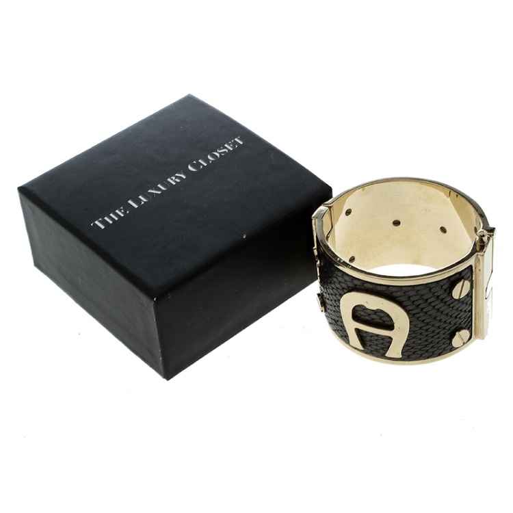 مملوكة مسبقًا Aigner Metallic Leather Gold Tone Wide Cuff Bracelet 18cm