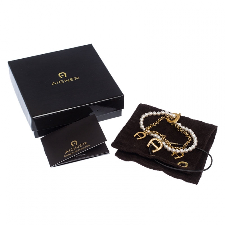 Aigner Crystal Logo Charm And Faux Pearl Gold Plated Layered Bracelet Aigner Tlc