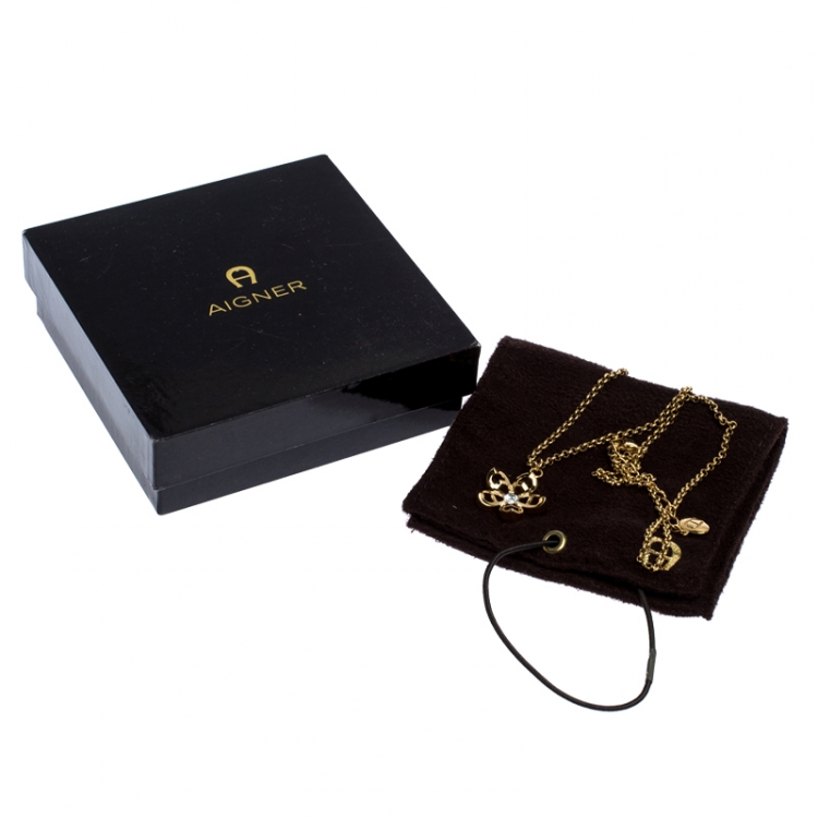 مملوكة مسبقًا Aigner Gold Tone Crystal Embellished Pendant Necklace
