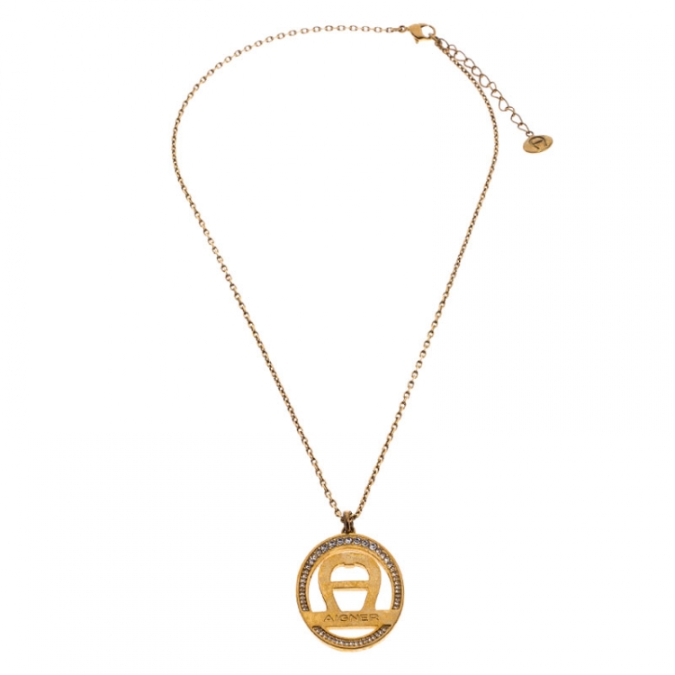 Pre Owned Aigner Logo Crystal Gold Tone Earring Necklace Set
