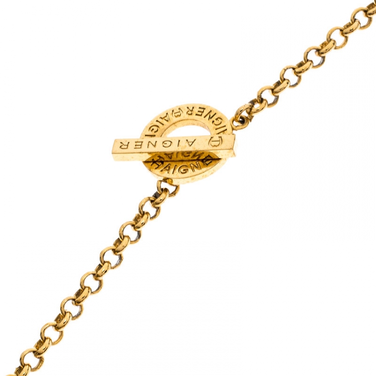 Pre Owned Aigner Crystal Studded Bow Gold Tone Long Toggle Necklace 