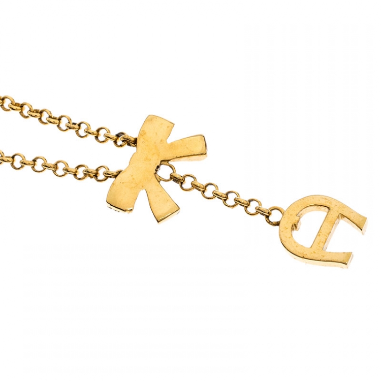 Pre Owned Aigner Crystal Studded Bow Gold Tone Long Toggle Necklace 