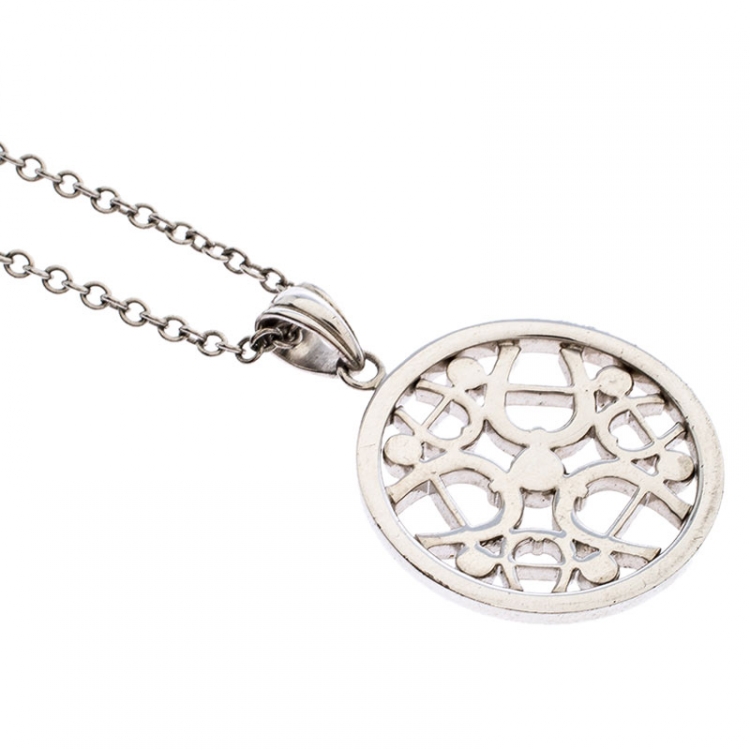 Pre Owned Aigner Silver Tone Crystal Embellished Monogram Pendant Necklace