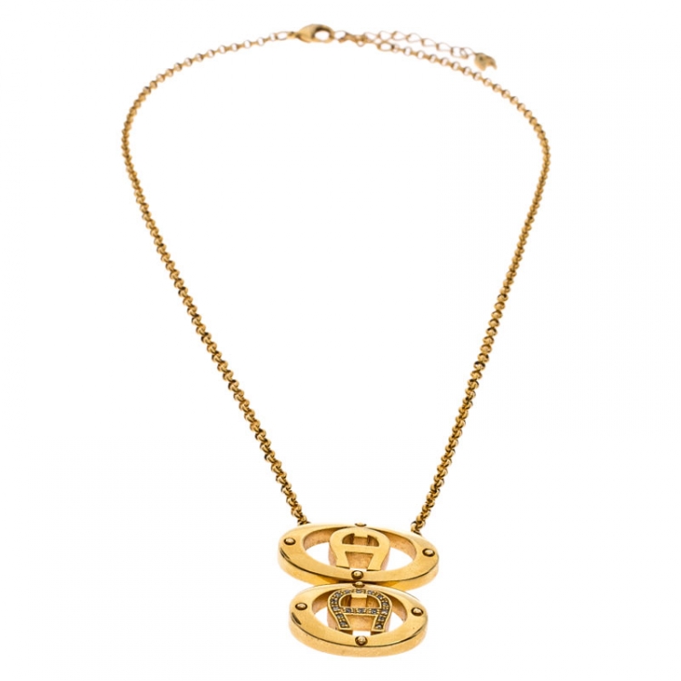 Pre Owned  Aigner Gold Plated Crystal Dual Monogram Pendant Necklace 