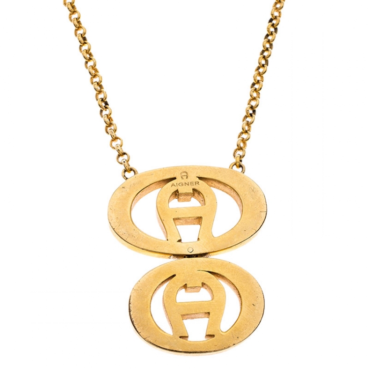 Pre Owned  Aigner Gold Plated Crystal Dual Monogram Pendant Necklace 