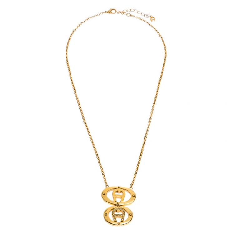 Pre Owned  Aigner Gold Plated Crystal Dual Monogram Pendant Necklace 