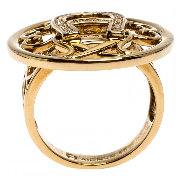 Pre Owned Aigner Gold Tone Crystal Embellished Logo Ring Size 56