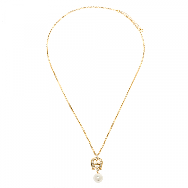 Pre Owned Aigner Crystal Faux Pearl Gold Tone Long Pendant Necklace