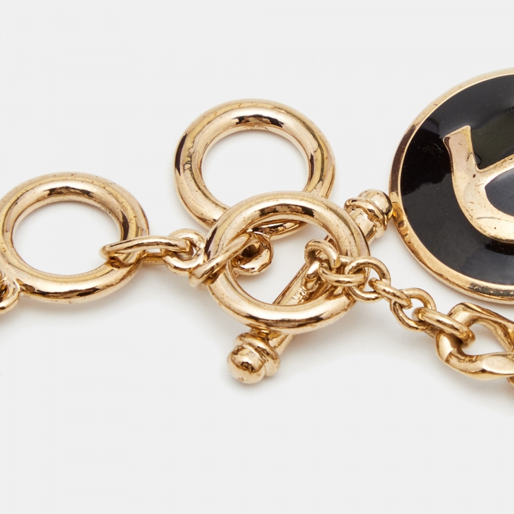 Pre Owned Aigner Enamel Crystal Gold Tone Metal Charm Bracelet