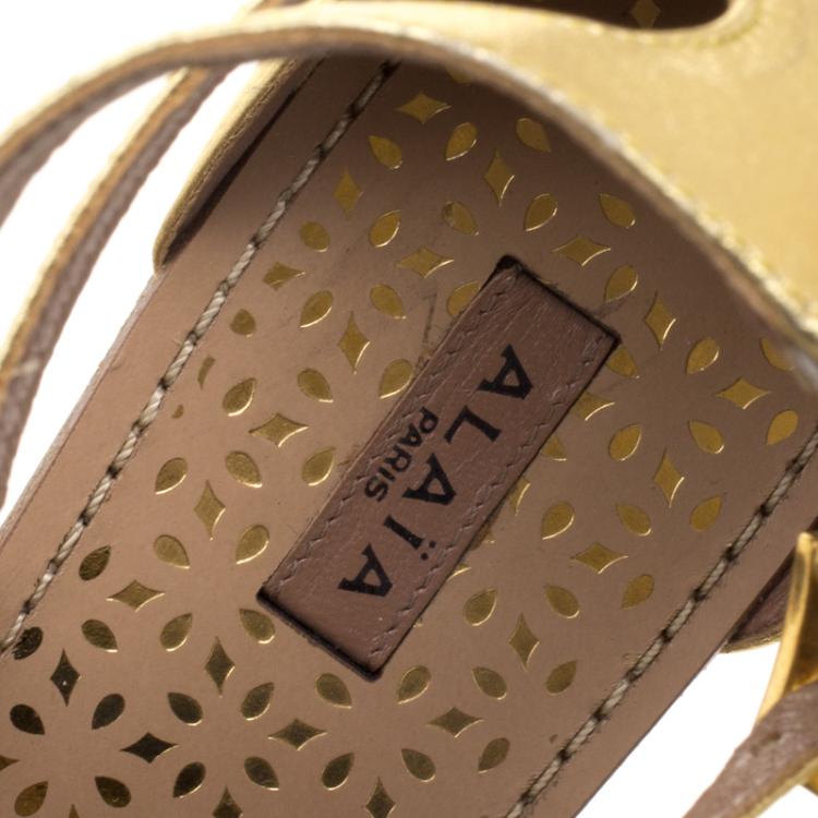 Pre Owned Alaia Gold And Beige Cutout Suede T-Strap Flat Gladiator Sandals Size 40.5