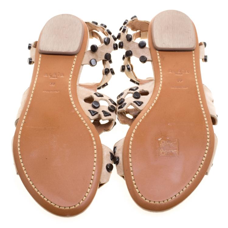 Pre Owned Alaia Beige Stud Embellished Cutout Suede Ankle Strap Flat Sandals Size 39