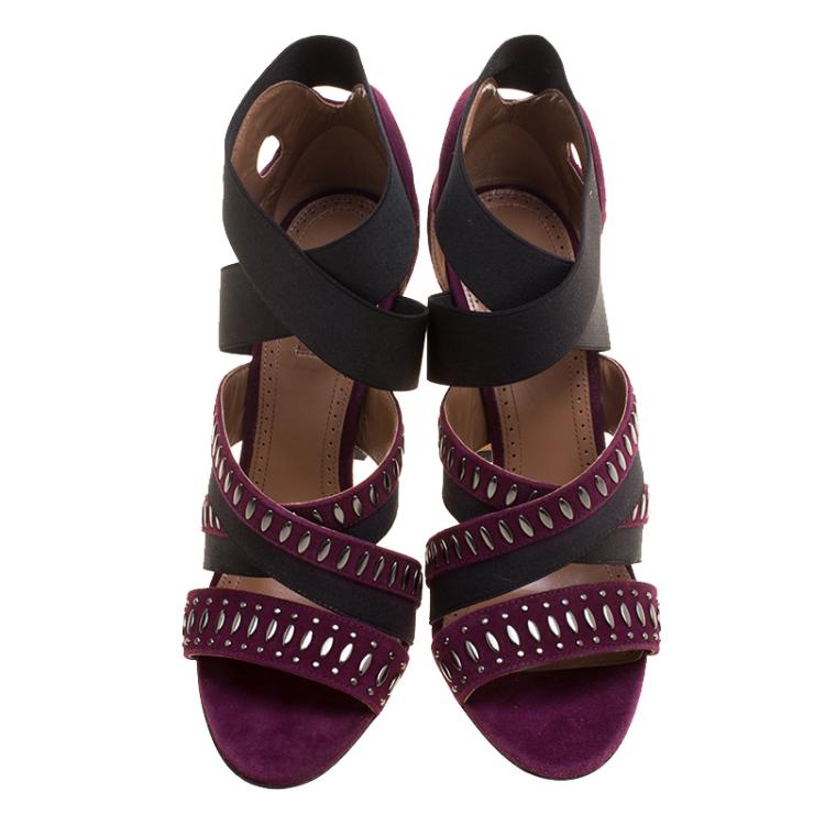 ممل�وكة مسبقًا Alaia Bordeaux Studded Suede Cross Strap Peep Toe Sandals Size 38