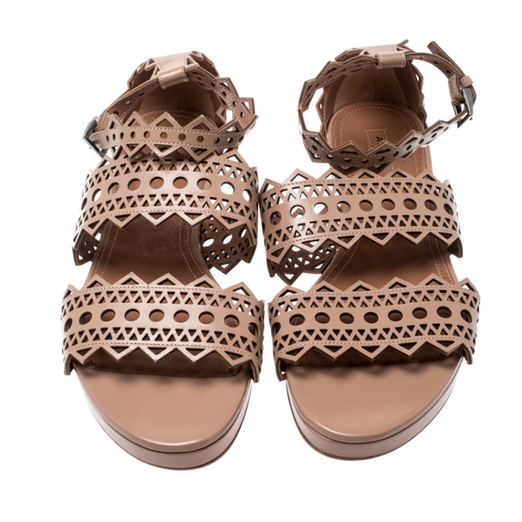 Pre Owned Alaia Beige Laser Cut Ankle Strap Flat Sandals Size 40