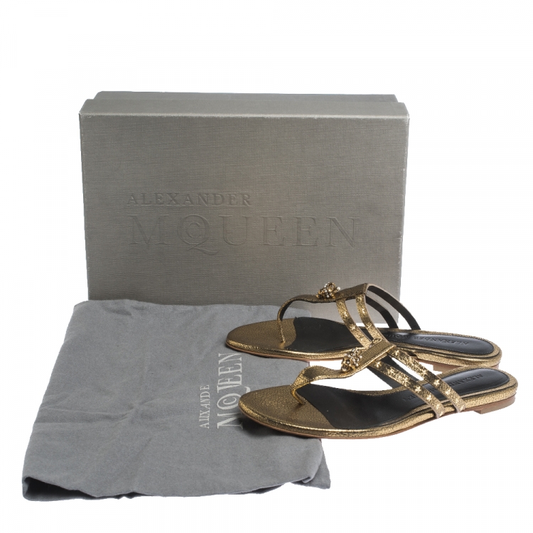 Pre Owned Alexander McQueen Metallic Gold Leather Embellished Skull Flat Thong Sandals Size 37