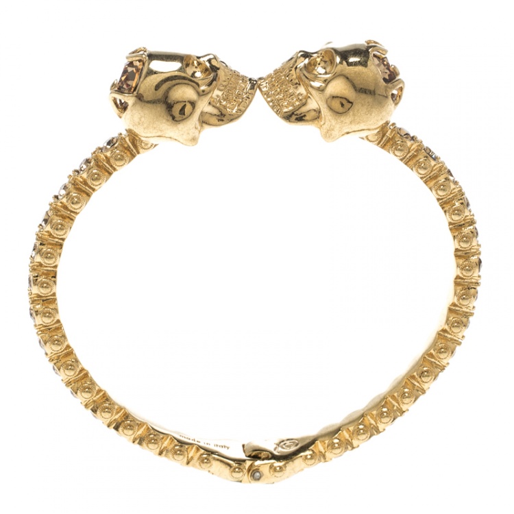 Pre Owned Alexander McQueen Twin Crystal Embedded Skull Gold Tone Cuff Bracelet