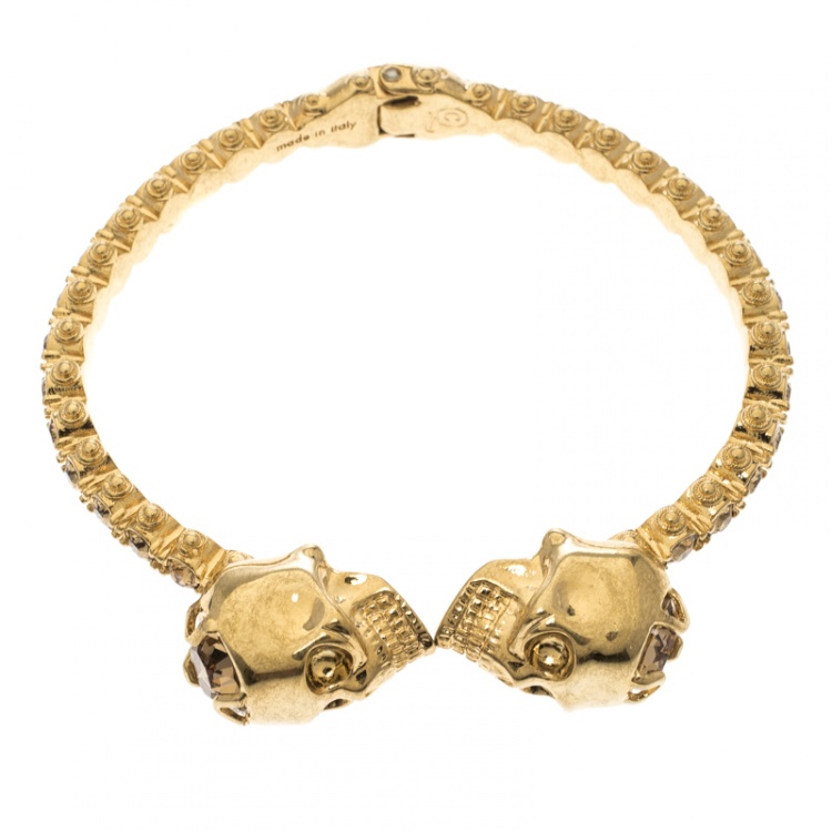 Pre Owned Alexander McQueen Twin Crystal Embedded Skull Gold Tone Cuff Bracelet