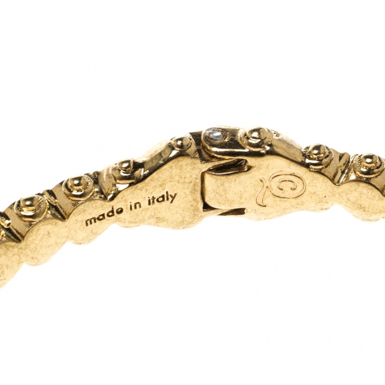 Pre Owned Alexander McQueen Twin Crystal Embedded Skull Gold Tone Cuff Bracelet