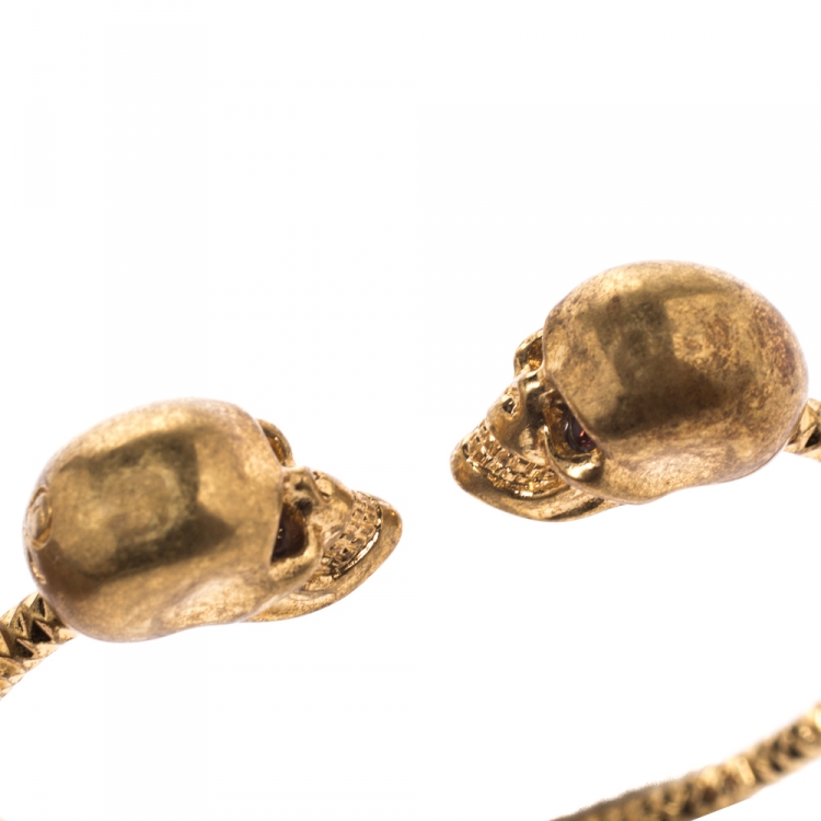 Pre Owned McQ by Alexander McQueen Aged Gold Tone Crystal Twin Skull Open Bracelet