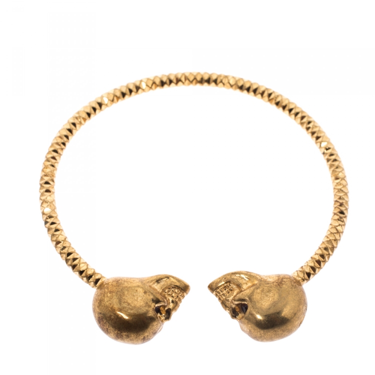 Pre Owned McQ by Alexander McQueen Aged Gold Tone Crystal Twin Skull Open Bracelet