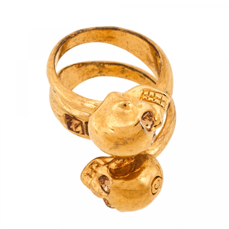 Pre Owned Alexander McQueen Twin Skull Motif Crystal Gold Tone Spiral Ring Size 54.5