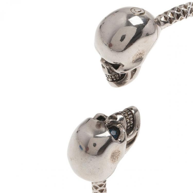 Pre Owned Alexander McQueen SilverTone Blue Crystal Twin Skull Bangle 19CM