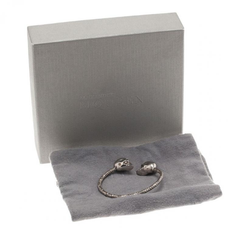 Pre Owned Alexander McQueen SilverTone Blue Crystal Twin Skull Bangle 19CM