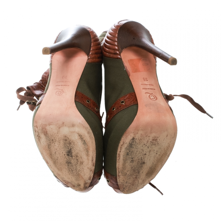Pre Owned Alexander McQueen Olive Green Eyelet Embellished Canvas And Textured Leather Peep-Toe Booties Size 38