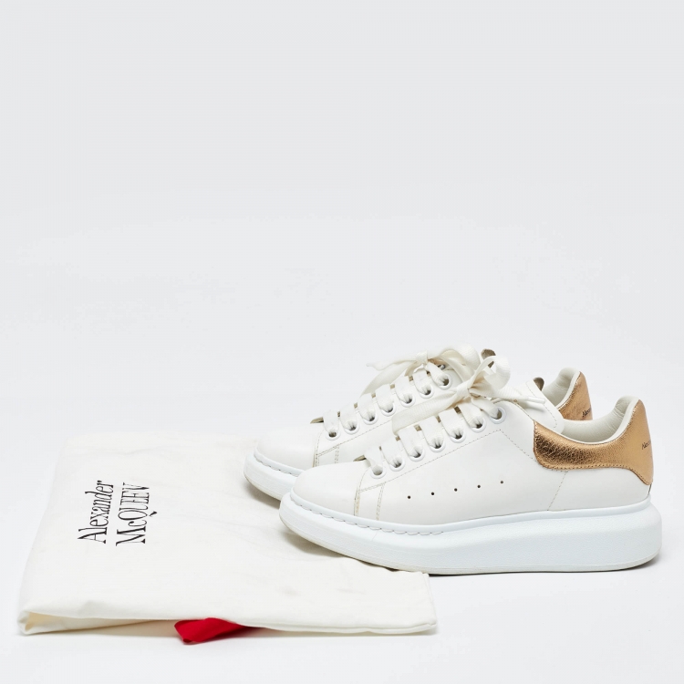 مملوكة مسبقًا Alexander McQueen White/Gold Leather Oversized Sneakers Size 37