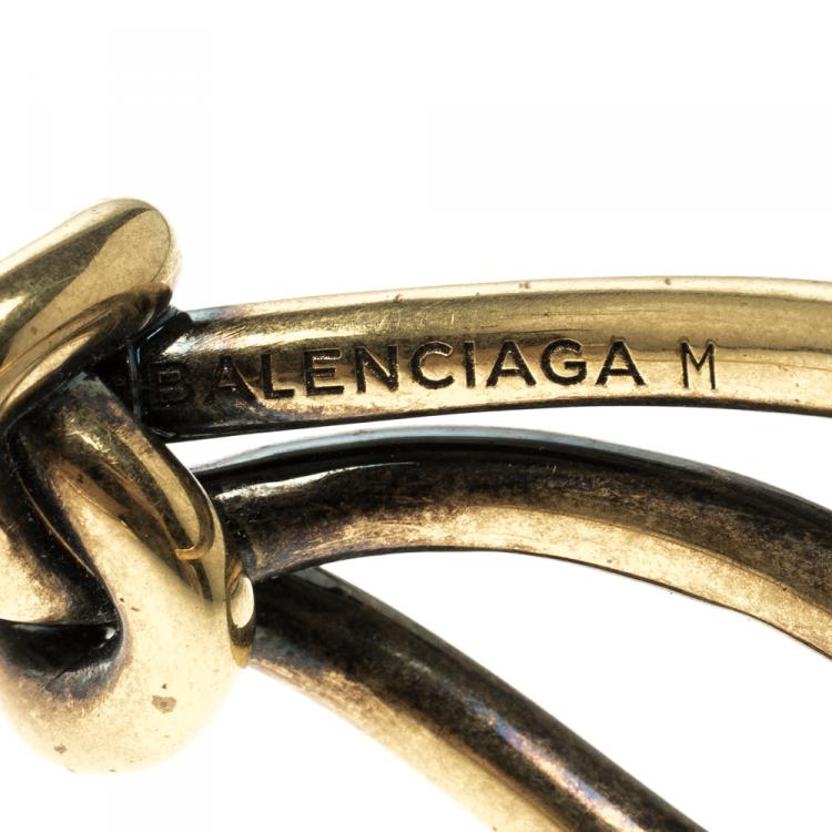 Pre Owned Balenciaga Bow Boucle Gold Tone Open Cuff Bracelet Size M