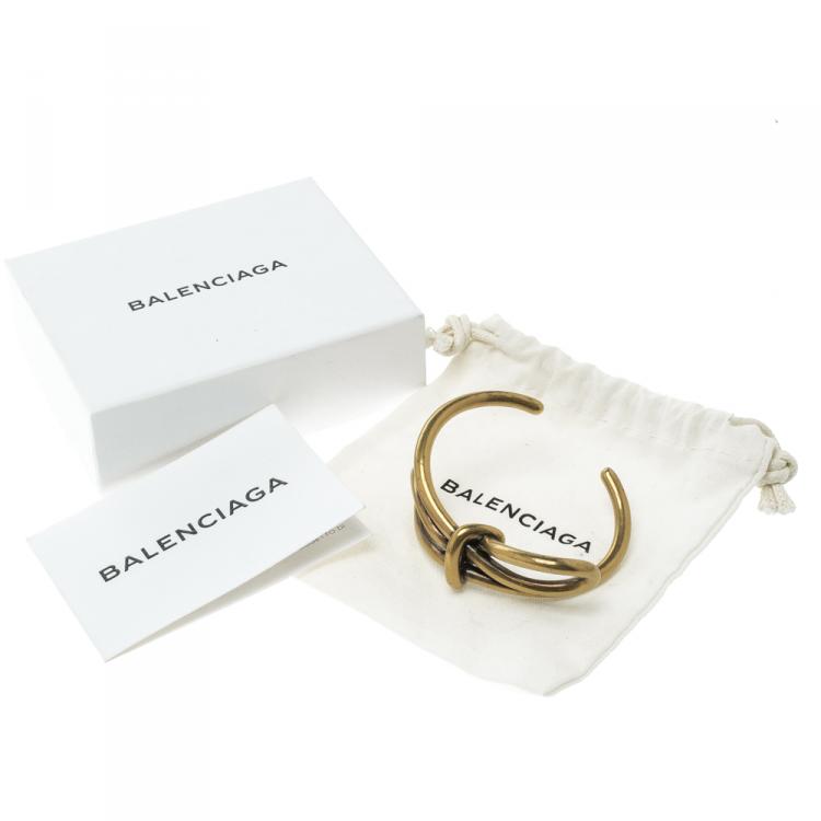 Pre Owned Balenciaga Bow Boucle Gold Tone Open Cuff Bracelet Size M