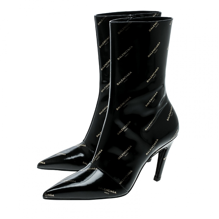 Pre Owned Balenciaga Black Patent Leather All Over Logo Slash Heel Ankle Boots Size 36