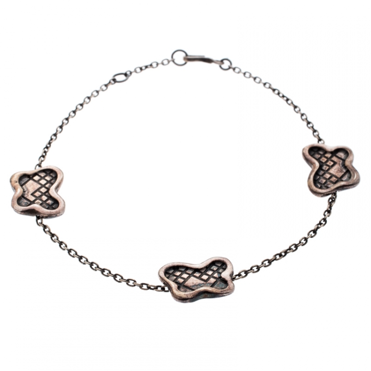 Pre Owned Bottega Veneta Intrecciato Engraved Butterfly Charm Sterling Silver Bracelet S