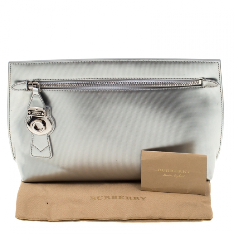 Pre Owned Burberry Silver Patent Leather Lock Trench Clutch