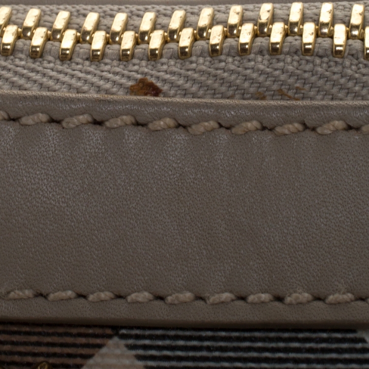 Pre Owned Burberry Beige Supernova Studded PVC and Leather Warrior Clutch