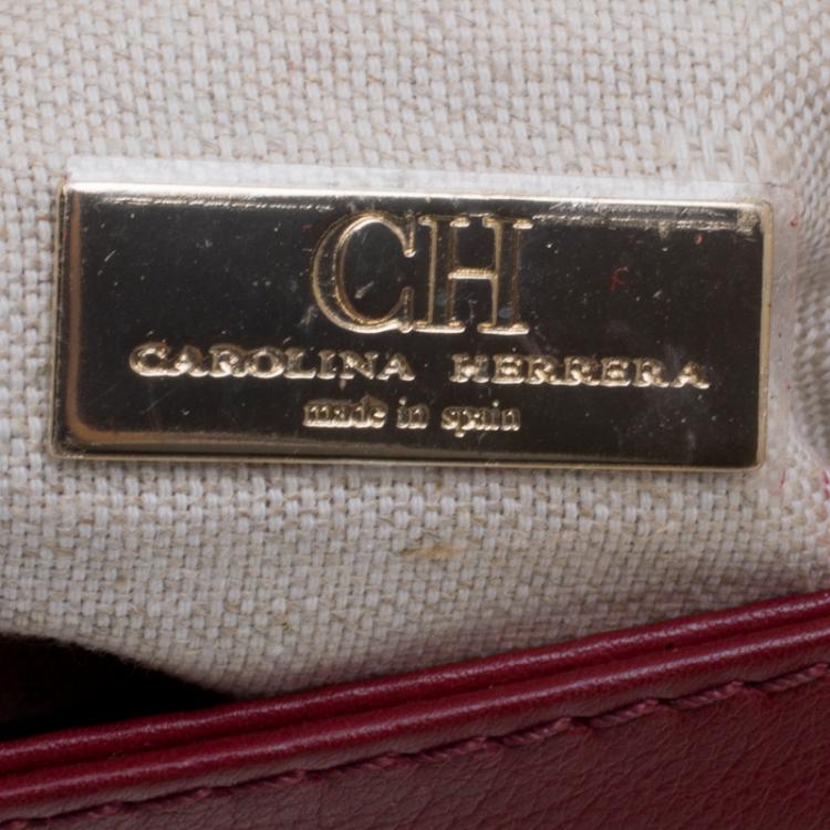 مملوكة مسبقًا Carolina Herrera Burgundy Leather Clutch