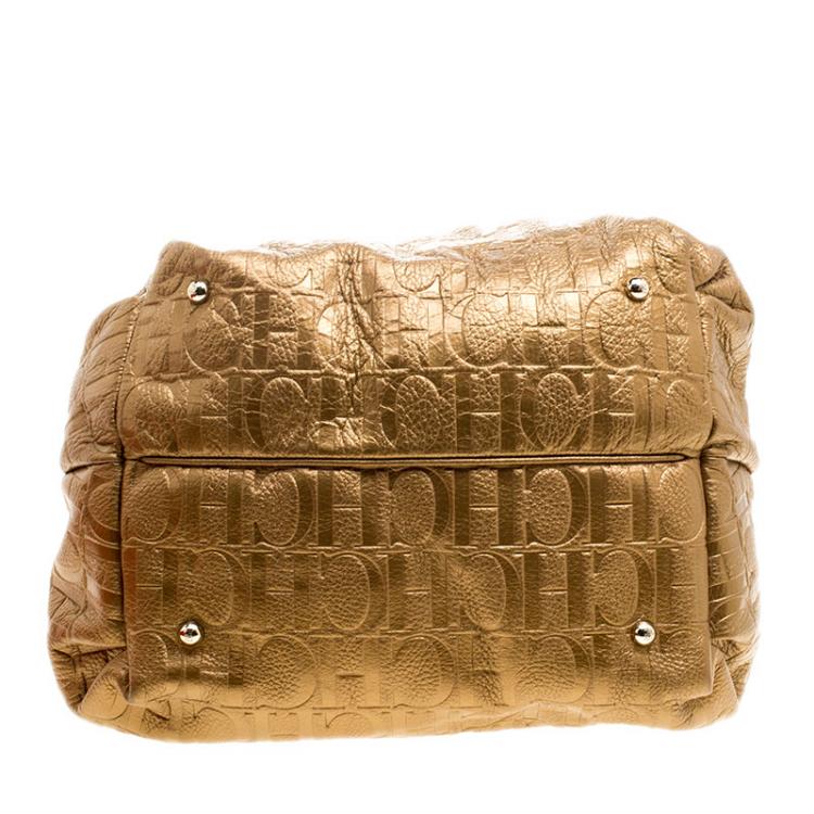Pre Owned Carolina Herrera Gold Monogram Embossed Leather Bow Bucket Shoulder Bag