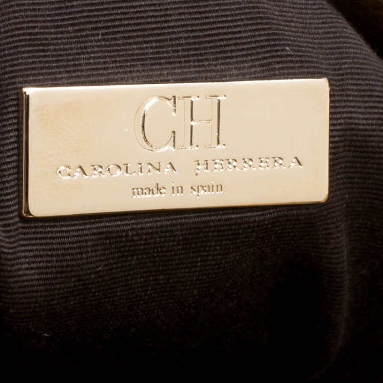 Pre Owned Carolina Herrera Gold Monogram Embossed Leather Bow Bucket Hobo